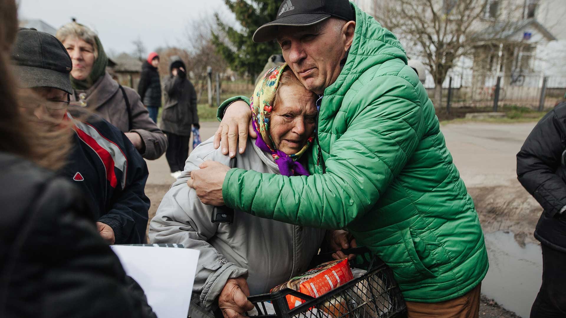 A Mission coordinator gives out vital supplies, Ukraine.