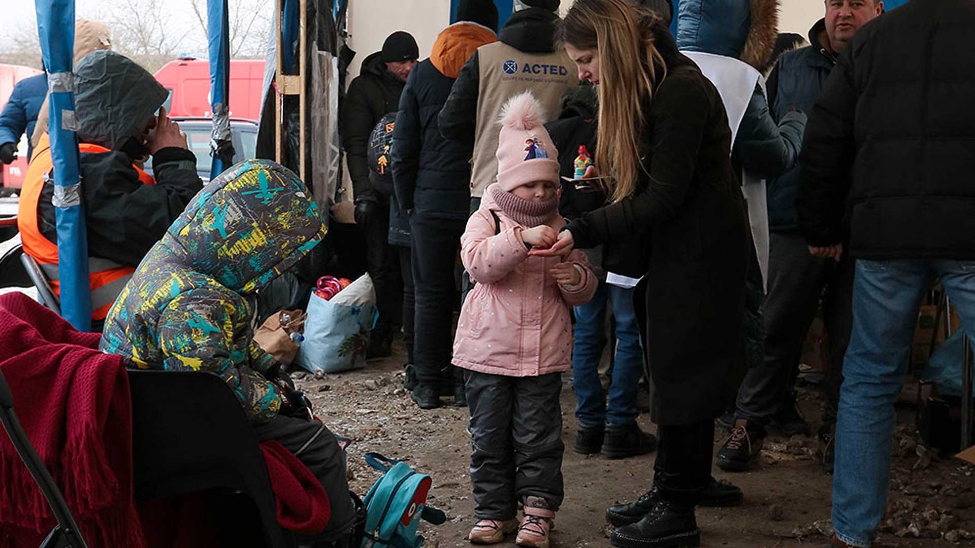 A child receives food, Ukraine.