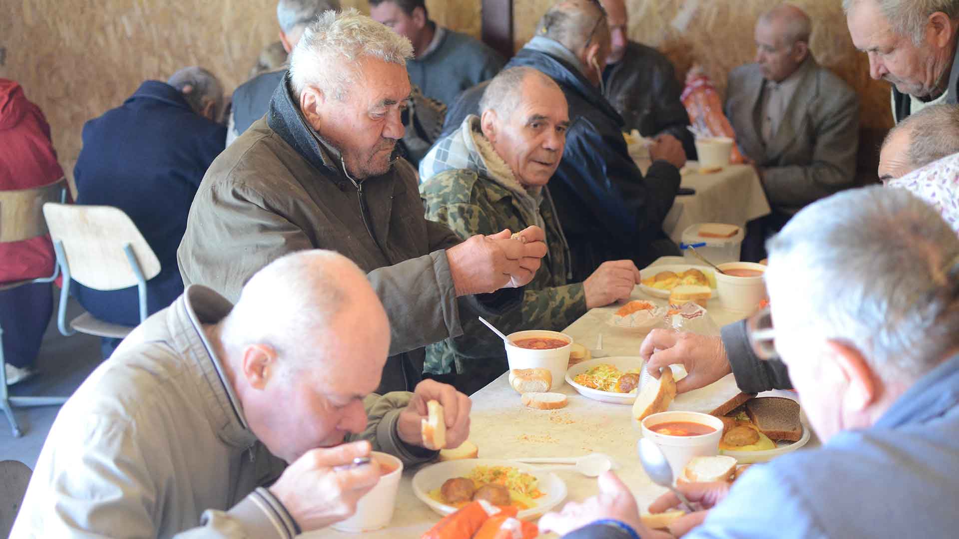 People enjoy warm soup and bread.