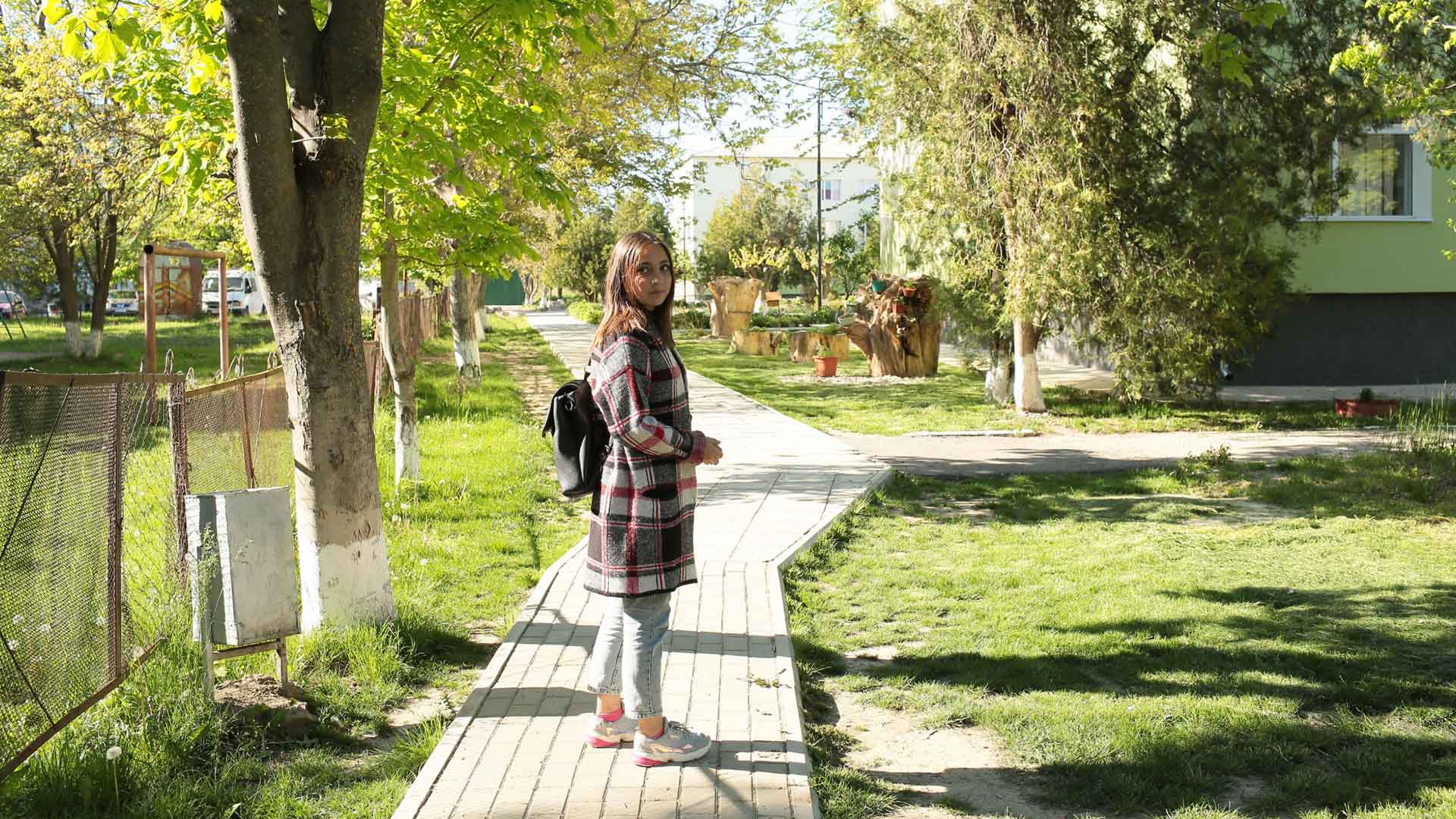 A girl in the school yard.